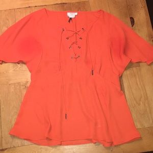 Cute orange lace up front orange top!